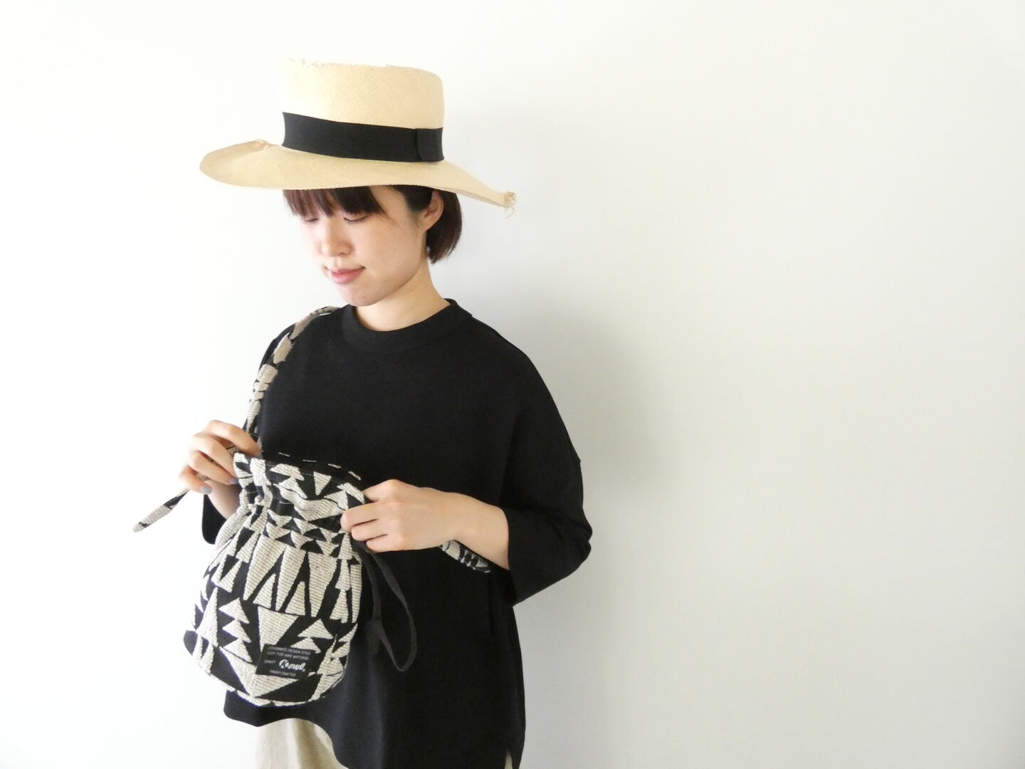 H(ホーク) 幾何学柄巾着BAGの商品画像1