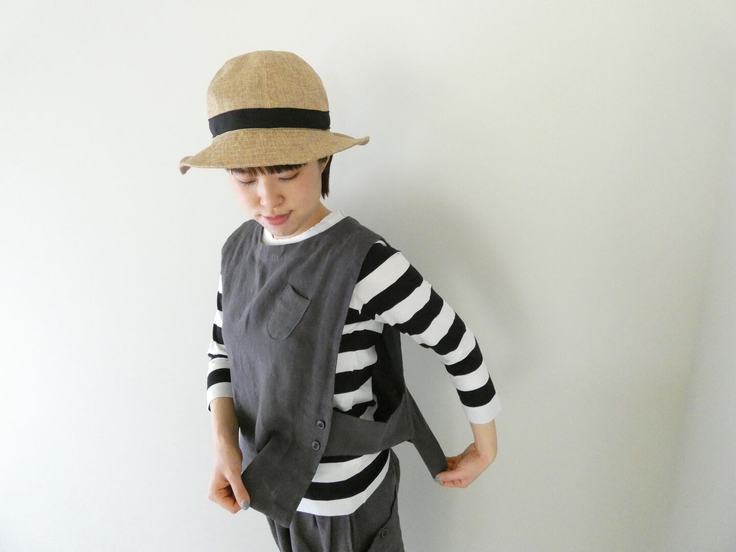 tumugu(ツムグ) リネンキャンバスアシンメトリーベストの商品画像1