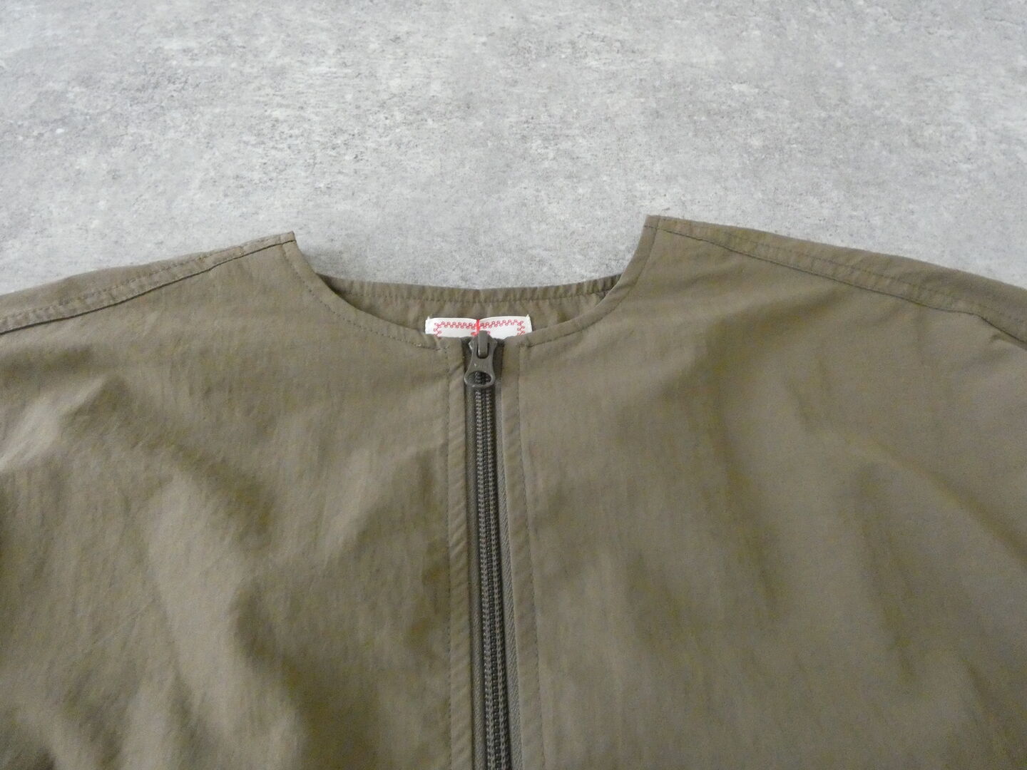 mao made(マオメイド) ヴィンテージウェザークルーネック裾ドロストジャケットの商品画像30